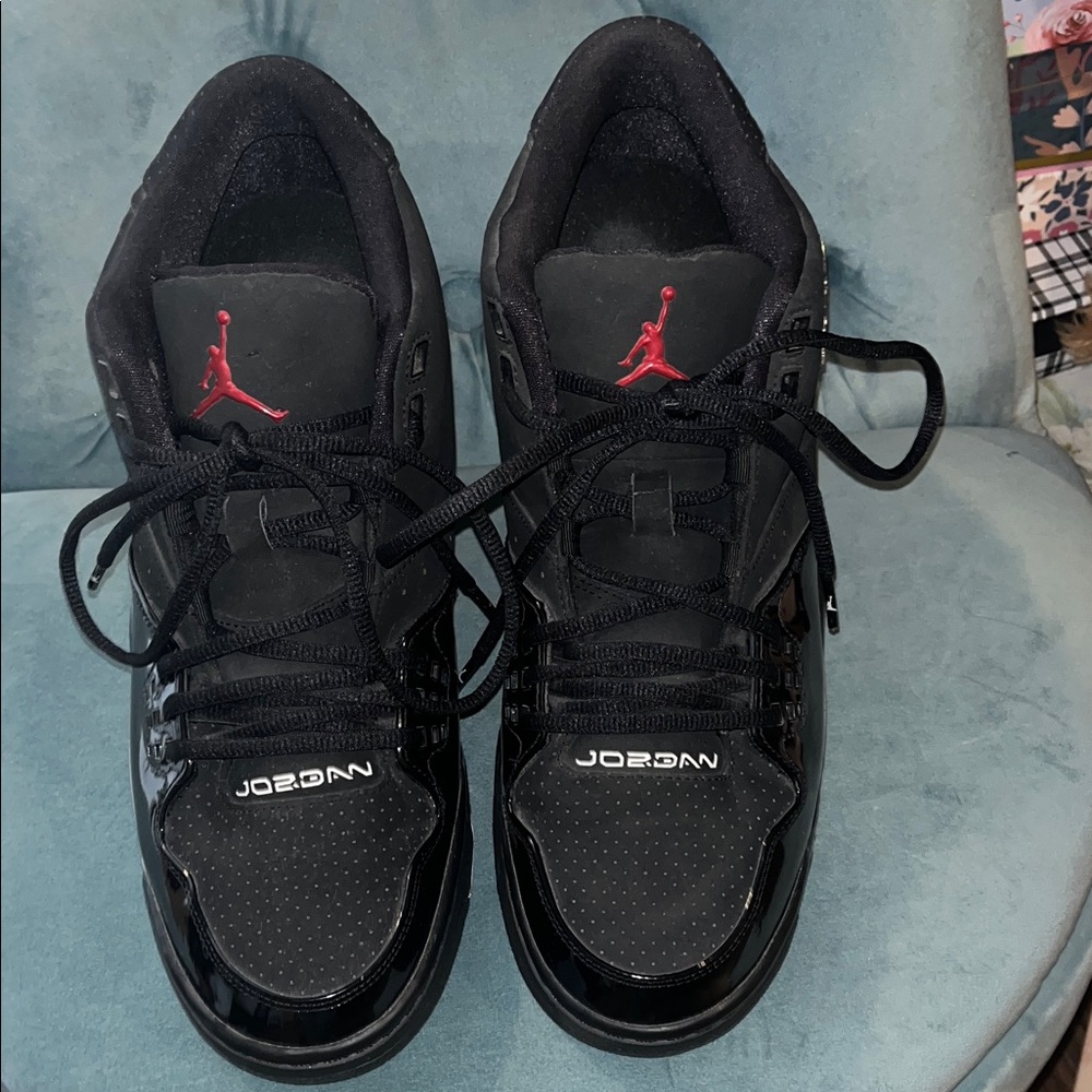 Jordan Men’s Black Sneakers with Red Jumpman Accents
